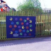 School play area activity wall blue hands JB Corrie